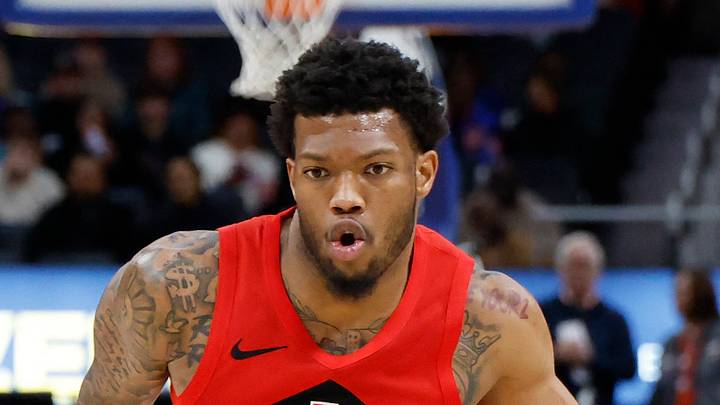 Toronto Raptors guard Alijah Martin dribbles defended by Detroit Pistons guard Isaiah Joe