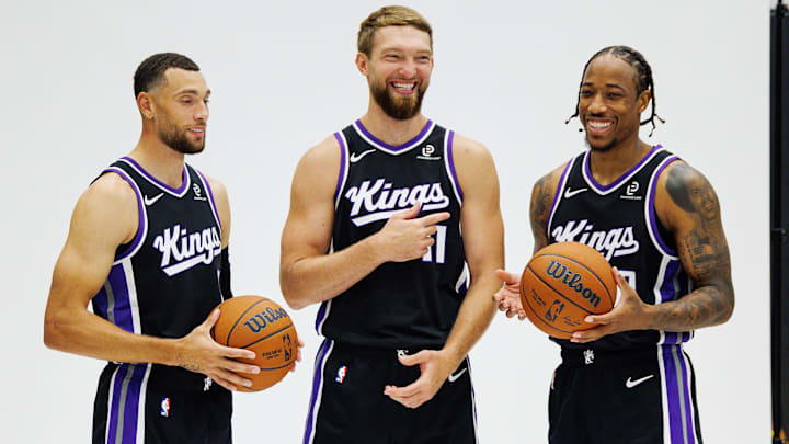 Sep 29, 2025; Sacramento, CA, USA; Sacramento Kings guard Zach LaVine (8), forward Domantas Sabonis (11), and forward DeMar DeRozan (10) pose for a photo during media day at Golden 1 Center.