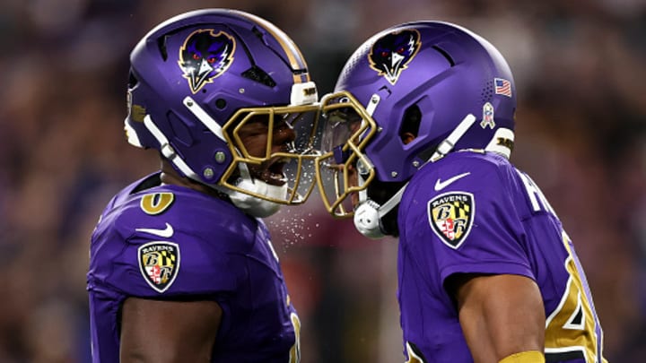 Baltimore Ravens linebacker Roquan Smith and cornerback Marlon Humphrey celebrate a play.