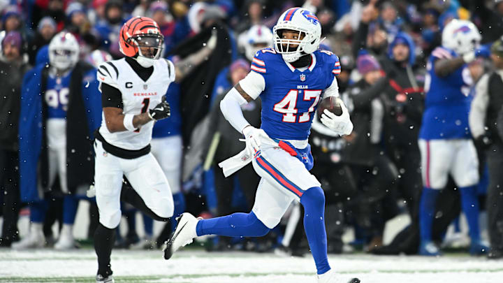 Buffalo Bills cornerback Christian Benford (47) runs the ball for a touchdown after an interception against the Cincinnati Bengals in the fourth quarter at Highmark Stadium.