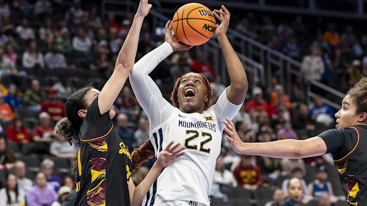 Mar 6, 2026; Kansas City, MO, USA; West Virginia forward Kierra Wheeler (22) attempts a contested shot against Arizona State during the first half at T-Mobile Center. Mandatory Credit: Nick Tre. Smith-Imagn Images