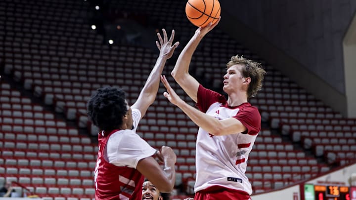 Indiana basketball forward Reed Bailey shoots over forward Sam Alexis in practice Sept. 30, 2025, at Assembly Hall.