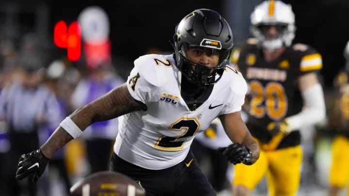 Sep 23, 2023; Laramie, Wyoming, USA; Appalachian State Mountaineers cornerback Tyrek Funderburk (2) mishandles a punt against the Wyoming Cowboys during the third quarter at Jonah Field at War Memorial Stadium. Mandatory Credit: Troy Babbitt-USA TODAY Sports Sep 23, 2023; Laramie, Wyoming, USA; Appalachian State Mountaineers cornerback Tyrek Funderburk (2) mishandles a punt against the Wyoming Cowboys during the third quarter at Jonah Field at War Memorial Stadium. Mandatory Credit: Troy Babbitt-USA TODAY Sports