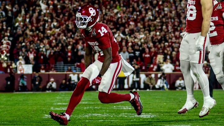 Oklahoma wide receiver Elijah Thomas celebrates after making a tackle against Alabama in the CFP.