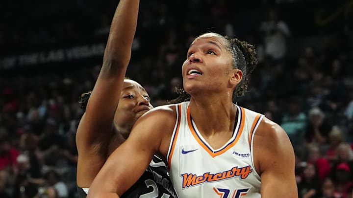 Oct 3, 2025; Las Vegas, Nevada, USA; Phoenix Mercury forward Alyssa Thomas (25) looks to shoot against Las Vegas Aces guard Jewell Loyd (24) during the second quarter of game one of the 2025 WNBA Finals at Michelob Ultra Arena. Mandatory Credit: Stephen R. Sylvanie-Imagn Images Oct 3, 2025; Las Vegas, Nevada, USA; Phoenix Mercury forward Alyssa Thomas (25) looks to shoot against Las Vegas Aces guard Jewell Loyd (24) during the second quarter of game one of the 2025 WNBA Finals at Michelob Ultra Arena. Mandatory Credit: Stephen R. Sylvanie-Imagn Images