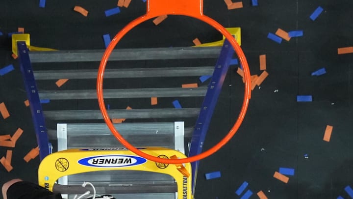 Apr 7, 2025; San Antonio, TX, USA;  Florida Gators head coach Todd Golden celebrates as he cuts down the net after defeating the Houston Cougars in the national championship game of the Final Four of the 2025 NCAA Tournament at the Alamodome. Mandatory Credit: Robert Deutsch-Imagn Images