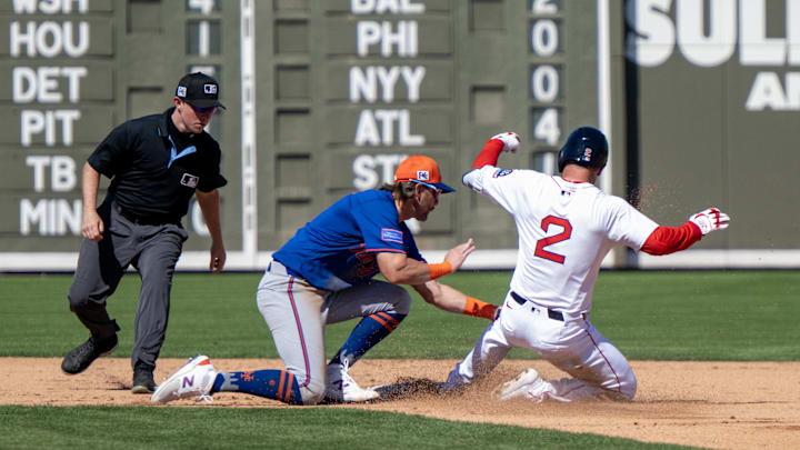 Mar 2, 2025; Fort Myers, Florida, USA; Boston Red Sox Alex Bregman (2) slides into second base avoiding the tag by New York Mets Jeff McNeil (1) in the fourth inning at JetBlue Park at Fenway South. Mandatory Credit: Chris Tilley-Imagn Images Mar 2, 2025; Fort Myers, Florida, USA; Boston Red Sox Alex Bregman (2) slides into second base avoiding the tag by New York Mets Jeff McNeil (1) in the fourth inning at JetBlue Park at Fenway South. Mandatory Credit: Chris Tilley-Imagn Images