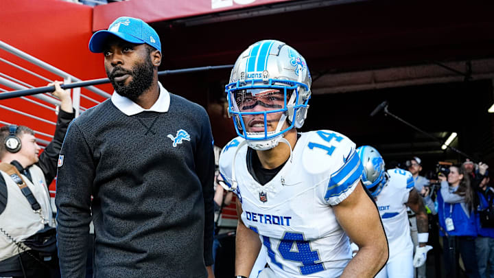 Detroit Lions wide receiver Amon-Ra St. Brown (14) next to assistant quarterbacks coach J.T Barrett Detroit Lions wide receiver Amon-Ra St. Brown (14) next to assistant quarterbacks coach J.T Barrett