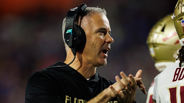 Nov 29, 2025; Gainesville, Florida, USA; Florida State Seminoles head coach Mike Norvell gestures against the Florida Gators during the second half at Ben Hill Griffin Stadium. Mandatory Credit: Matt Pendleton-Imagn Images