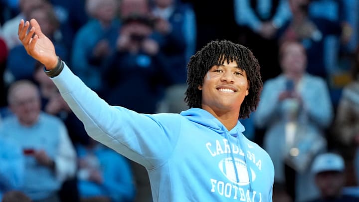 Dec 14, 2024; Chapel Hill, North Carolina, USA; North Carolina Tar Heels recruit quarterback Bryce Baker is introduced during half time at Dean E. Smith Center. Mandatory Credit: Bob Donnan-Imagn Images