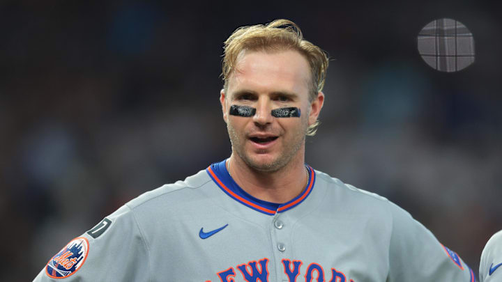 Sep 28, 2025; Miami, Florida, USA; New York Mets first baseman Pete Alonso (20) reacts while standing next to shortstop Francisco Lindor (12) after his at bat against the Miami Marlins during the fifth inning at loanDepot Park. Mandatory Credit: Sam Navarro-Imagn Images