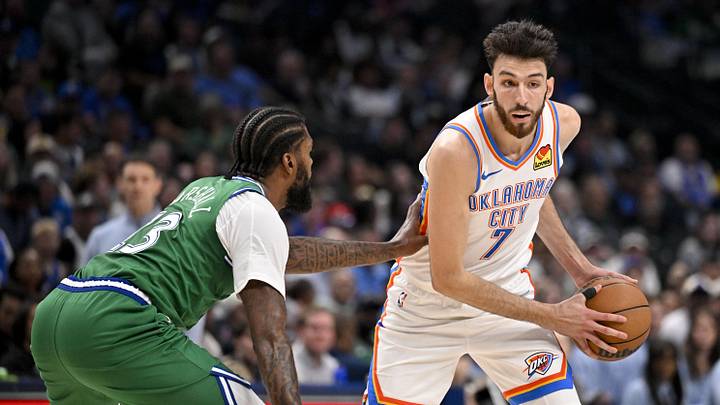 Oct 27, 2025; Dallas, Texas, USA; Oklahoma City Thunder center Chet Holmgren (7) looks to move the ball past Dallas Mavericks forward Naji Marshall (13) during the second quarter at the American Airlines Center. Mandatory Credit: Jerome Miron-Imagn Images Oct 27, 2025; Dallas, Texas, USA; Oklahoma City Thunder center Chet Holmgren (7) looks to move the ball past Dallas Mavericks forward Naji Marshall (13) during the second quarter at the American Airlines Center. Mandatory Credit: Jerome Miron-Imagn Images