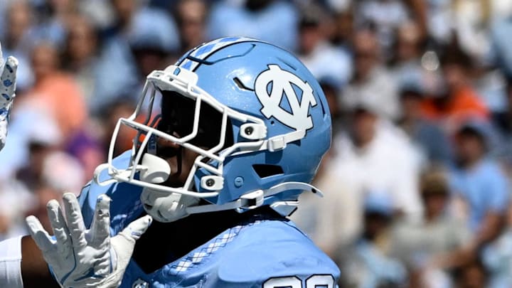Oct 4, 2025; Chapel Hill, North Carolina, USA; Clemson Tigers wide receiver Bryant Wesco Jr. (12) attempts to catch a pass in the end zone as North Carolina Tar Heels defensive back Marcus Allen (29) defends in the first quarter at Kenan Stadium. Mandatory Credit: Bob Donnan-Imagn Images Oct 4, 2025; Chapel Hill, North Carolina, USA; Clemson Tigers wide receiver Bryant Wesco Jr. (12) attempts to catch a pass in the end zone as North Carolina Tar Heels defensive back Marcus Allen (29) defends in the first quarter at Kenan Stadium. Mandatory Credit: Bob Donnan-Imagn Images