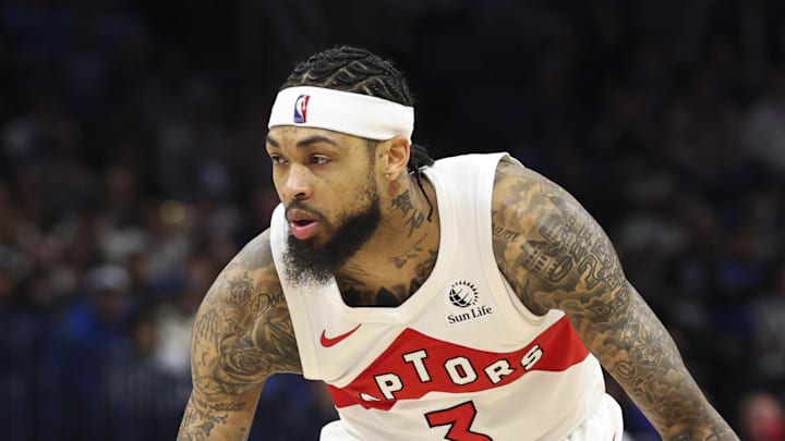 Toronto Raptors forward Brandon Ingram is guarded by Orlando Magic guard Anthony Black. Toronto Raptors forward Brandon Ingram is guarded by Orlando Magic guard Anthony Black.