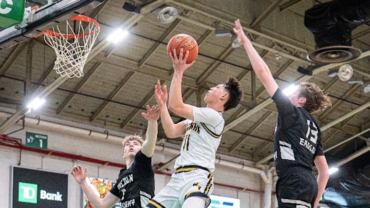 Medomak Valley’s Mason Nguyen soars in for a bucket during Medomak Valley's win over Lincoln Academy.