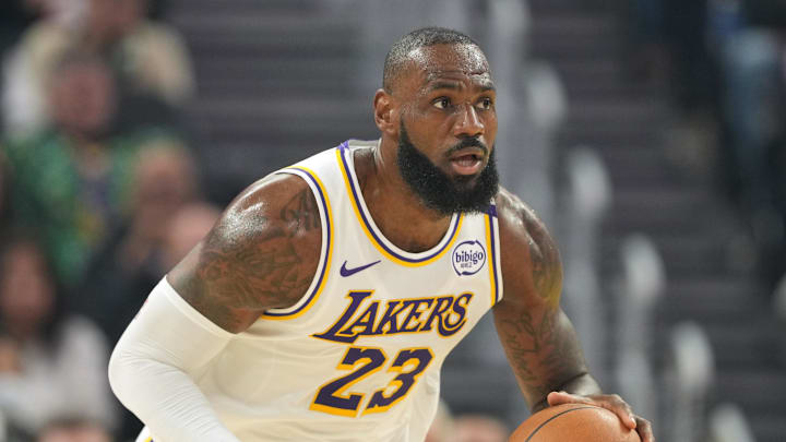 Dec 25, 2024; San Francisco, California, USA; Los Angeles Lakers forward LeBron James (23) dribbles against the Golden State Warriors during the first quarter at Chase Center. Mandatory Credit: Darren Yamashita-Imagn Images
