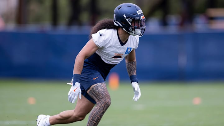 Denver Broncos safety Talanoa Hufanga (9) practices during OTAs at Broncos Park Powered by CommonSpirit. 