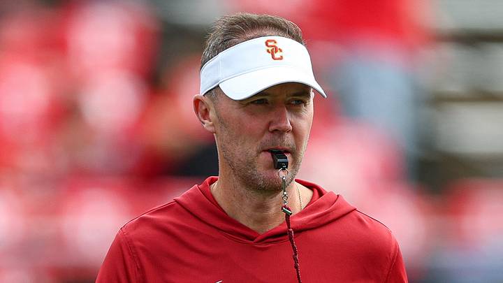 Sep 19, 2026; Piscataway, New Jersey, USA; USC Trojans head coach Lincoln Riley on the field during warm ups before the game against the Rutgers Scarlet Knights at SHI Stadium. Mandatory Credit: Vincent Carchietta-Imagn Images Sep 19, 2026; Piscataway, New Jersey, USA; USC Trojans head coach Lincoln Riley on the field during warm ups before the game against the Rutgers Scarlet Knights at SHI Stadium. Mandatory Credit: Vincent Carchietta-Imagn Images