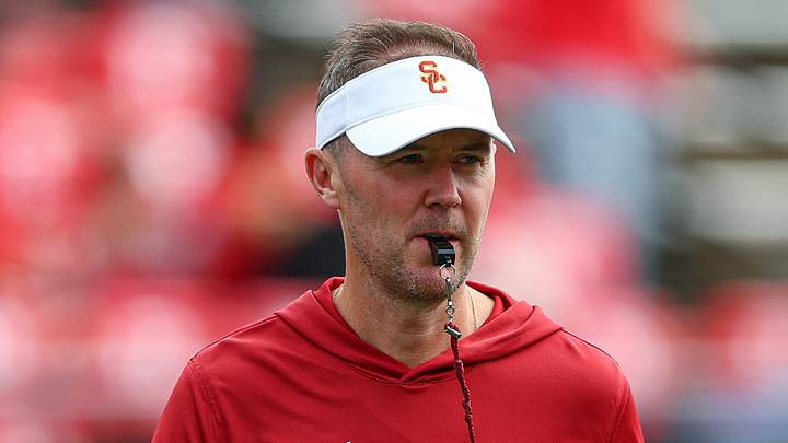 Sep 19, 2026; Piscataway, New Jersey, USA; USC Trojans head coach Lincoln Riley on the field during warm ups before the game against the Rutgers Scarlet Knights at SHI Stadium. Mandatory Credit: Vincent Carchietta-Imagn Images Sep 19, 2026; Piscataway, New Jersey, USA; USC Trojans head coach Lincoln Riley on the field during warm ups before the game against the Rutgers Scarlet Knights at SHI Stadium. Mandatory Credit: Vincent Carchietta-Imagn Images