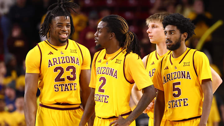 Jan 24, 2026; Tempe, Arizona, USA; Arizona State Sun Devils forward Allen Mukeba (23), guard Anthony Johnson (2) and guard Maurice Odum (5) against the Cincinnati Bearcats at Desert Financial Arena. Mandatory Credit: Mark J. Rebilas-Imagn Images