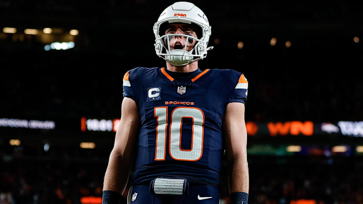 Dec 2, 2024; Denver, Colorado, USA; Denver Broncos quarterback Bo Nix (10) reacts after a play in the third quarter against the Cleveland Browns at Empower Field at Mile High. 