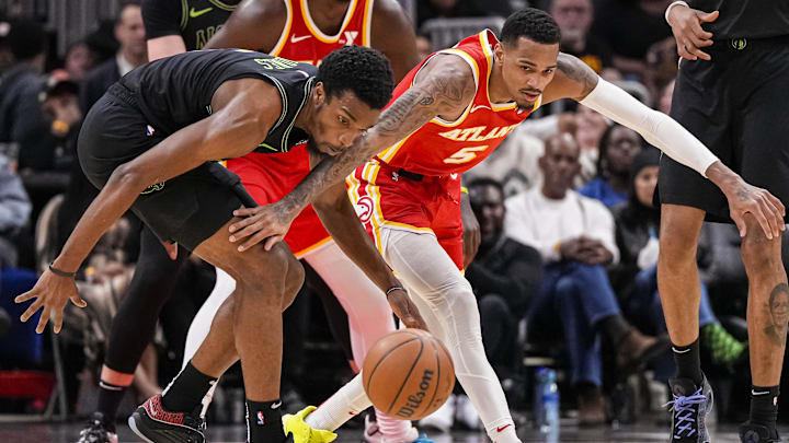 New Orleans Pelicans forward Herbert Jones and Atlanta Hawks guard Dejounte Murray