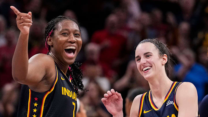 Indiana Fever forward Aliyah Boston (7) celebrates with Indiana Fever guard Caitlin Clark (22) altering recording a triple-double Wednesday, Sept. 4, 2024, during the game at Gainbridge Fieldhouse in Indianapolis. The Indiana Fever defeated the Los Angeles Sparks, 93-86. Indiana Fever forward Aliyah Boston (7) celebrates with Indiana Fever guard Caitlin Clark (22) altering recording a triple-double Wednesday, Sept. 4, 2024, during the game at Gainbridge Fieldhouse in Indianapolis. The Indiana Fever defeated the Los Angeles Sparks, 93-86.
