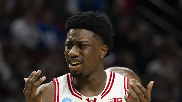 Mar 19, 2026; Portland, OR, USA; Wisconsin Badgers guard Braeden Carrington (0) and guard John Blackwell (25) react during the second half of a first round game of the men's 2026 NCAA Tournament against the High Point Panthers at Moda Center. Mandatory Credit: Troy Wayrynen-Imagn Images