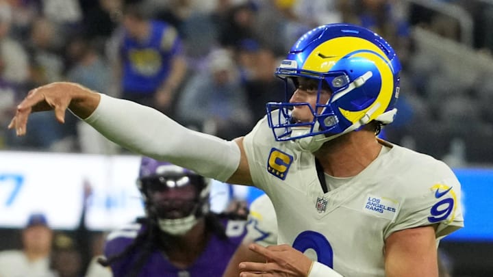 Oct 24, 2024; Inglewood, California, USA; Los Angeles Rams quarterback Matthew Stafford (9) throws a 7-yard touchdown pass against the Minnesota Vikings in the first half at SoFi Stadium. Mandatory Credit: Kirby Lee-Imagn Images