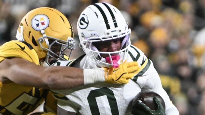 Green Bay Packers wide receiver Matthew Golden is tackled during the game against the Pittsburgh Steelers.