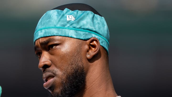 Seattle Mariners right fielder Samad Taylor (0) gestures to the dugout after a bunt base hit during the seventh inning against the Los Angeles Angels at T-Mobile Park on April 30. Seattle Mariners right fielder Samad Taylor (0) gestures to the dugout after a bunt base hit during the seventh inning against the Los Angeles Angels at T-Mobile Park on April 30.