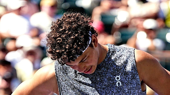 Ben Shelton reacts to a point