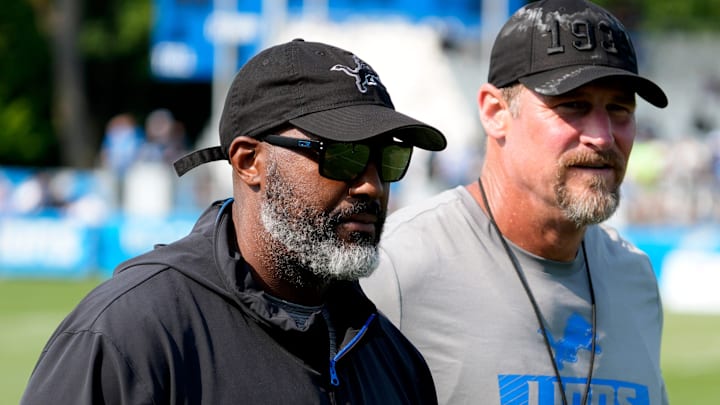 Detroit Lions executive vice president and general manager Brad Holmes, left, and Lions head coach Dan Campbell head off the practice field at the team's training facility in Allen Park on Wednesday, Aug. 14, 2024.