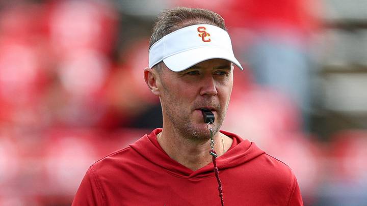 Sep 19, 2026; Piscataway, New Jersey, USA; USC Trojans head coach Lincoln Riley on the field during warm ups before the game against the Rutgers Scarlet Knights at SHI Stadium. Mandatory Credit: Vincent Carchietta-Imagn Images Sep 19, 2026; Piscataway, New Jersey, USA; USC Trojans head coach Lincoln Riley on the field during warm ups before the game against the Rutgers Scarlet Knights at SHI Stadium. Mandatory Credit: Vincent Carchietta-Imagn Images