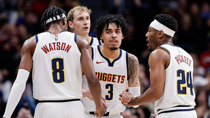 Oct 15, 2023; Denver, Colorado, USA; Denver Nuggets forward Julian Strawther (3) with forward Peyton Watson (8) and forward Hunter Tyson (4) and guard Jalen Pickett (24) in the second quarter against the Chicago Bulls at Ball Arena. Oct 15, 2023; Denver, Colorado, USA; Denver Nuggets forward Julian Strawther (3) with forward Peyton Watson (8) and forward Hunter Tyson (4) and guard Jalen Pickett (24) in the second quarter against the Chicago Bulls at Ball Arena.