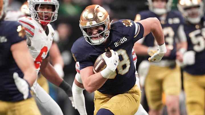 Jan 20, 2025; Atlanta, GA, USA; Notre Dame Fighting Irish tight end Mitchell Evans (88) runs after a catch against the Ohio State Buckeyes in the second half in the CFP National Championship college football game at Mercedes-Benz Stadium. Mandatory Credit: Dale Zanine-Imagn Images Jan 20, 2025; Atlanta, GA, USA; Notre Dame Fighting Irish tight end Mitchell Evans (88) runs after a catch against the Ohio State Buckeyes in the second half in the CFP National Championship college football game at Mercedes-Benz Stadium. Mandatory Credit: Dale Zanine-Imagn Images