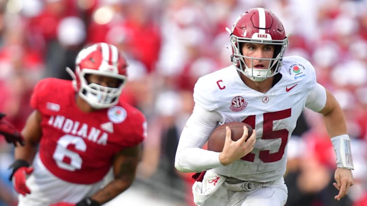 Jan 1, 2026; Pasadena, CA, USA; Alabama Crimson Tide quarterback Ty Simpson (15) runs against the Indiana Hoosiers in the first half of the 2026 Rose Bowl and quarterfinal game of the College Football Playoff at Rose Bowl Stadium. Mandatory Credit: Gary A. Vasquez-Imagn Images