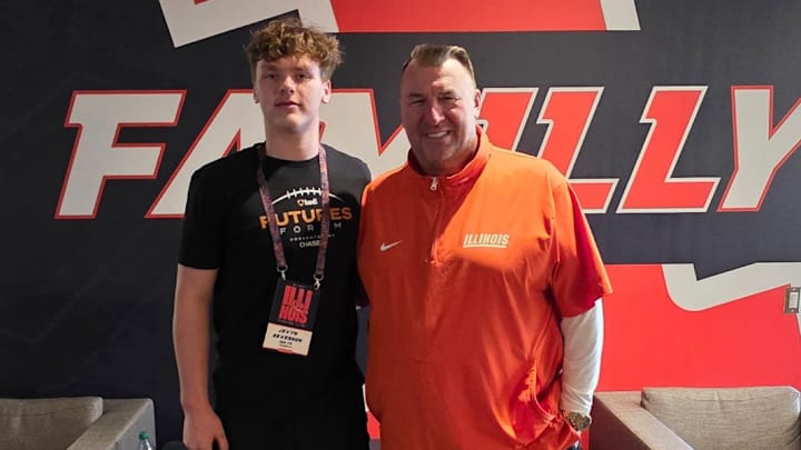 Madrid star Jevyn Severson stands with Illinois head football coach Bret Bielema. Madrid star Jevyn Severson stands with Illinois head football coach Bret Bielema.