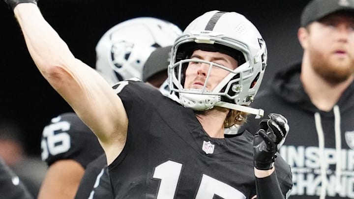 Dec 28, 2025; Paradise, Nevada, USA; Las Vegas Raiders quarterback Kenny Pickett (15) warms up before the game against the New York Giants at Allegiant Stadium. Mandatory Credit: Stephen R. Sylvanie-Imagn Images