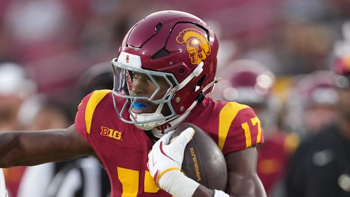 Aug 30, 2025; Los Angeles, California, USA; Southern California Trojans wide receiver Prince Strachan (17) carries the ball against Missouri State Bears linebacker Jashawn Cooper (21) in the second half at United Airlines Field at Los Angeles Memorial Coliseum. Mandatory Credit: Kirby Lee-Imagn Images Aug 30, 2025; Los Angeles, California, USA; Southern California Trojans wide receiver Prince Strachan (17) carries the ball against Missouri State Bears linebacker Jashawn Cooper (21) in the second half at United Airlines Field at Los Angeles Memorial Coliseum. Mandatory Credit: Kirby Lee-Imagn Images