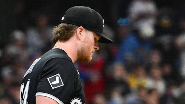 Mar 26, 2026; Milwaukee, Wisconsin, USA; Chicago White Sox starting pitcher Shane Smith (64) gets a mound visit in the second inning against the Milwaukee Brewers at American Family Field. Mandatory Credit: Benny Sieu-Imagn Images