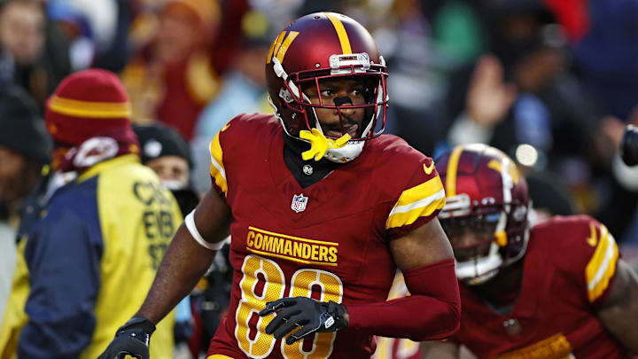 Dec 22, 2024; Landover, Maryland, USA; Washington Commanders wide receiver Jamison Crowder (80) celebrates after scoring the gaming winning touchdown during the fourth quarter against the Philadelphia Eagles at Northwest Stadium. Mandatory Credit: Peter Casey-Imagn Images Dec 22, 2024; Landover, Maryland, USA; Washington Commanders wide receiver Jamison Crowder (80) celebrates after scoring the gaming winning touchdown during the fourth quarter against the Philadelphia Eagles at Northwest Stadium. Mandatory Credit: Peter Casey-Imagn Images