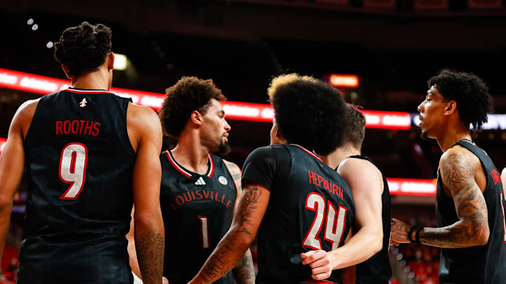 Feb 12, 2025; Raleigh, North Carolina, USA; Louisville Cardinals huddle during the second half of the game against the North Carolina State Wolfpack at Lenovo Center. Feb 12, 2025; Raleigh, North Carolina, USA; Louisville Cardinals huddle during the second half of the game against the North Carolina State Wolfpack at Lenovo Center.