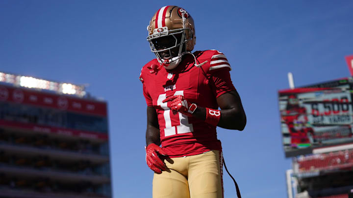 San Francisco 49ers wide receiver Brandon Aiyuk walks on the field before the start of the game against the Kansas City Chiefs.