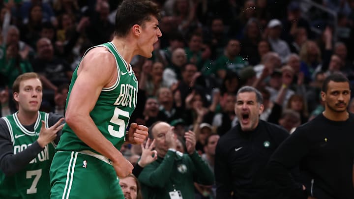 Mar 6, 2026; Boston, Massachusetts, USA; Boston Celtics center Luka Garza (52) celebrates after making a three point basket against the Dallas Mavericks during the second quarter at TD Garden. Mandatory Credit: Winslow Townson-Imagn Images