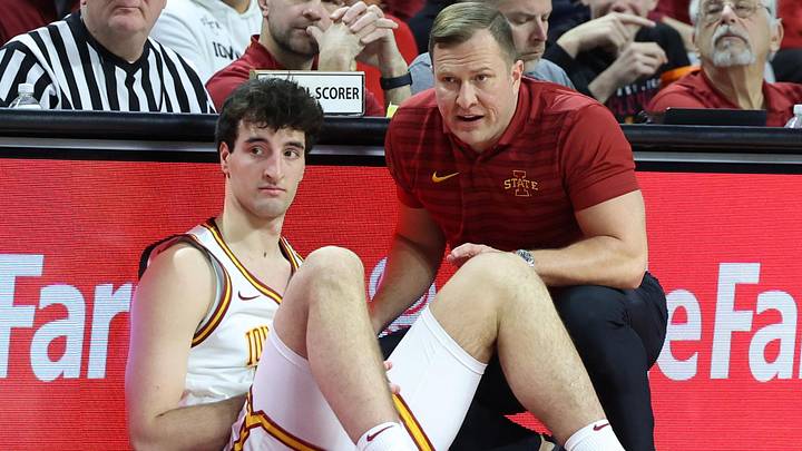 Feb 18, 2025; Ames, Iowa, USA; Iowa State Cyclones head coach T.J. Otzelberger talks to Iowa State Cyclones forward Milan Momcilovic (22) during the second half against the Colorado Buffaloes at James H. Hilton Coliseum. Feb 18, 2025; Ames, Iowa, USA; Iowa State Cyclones head coach T.J. Otzelberger talks to Iowa State Cyclones forward Milan Momcilovic (22) during the second half against the Colorado Buffaloes at James H. Hilton Coliseum.