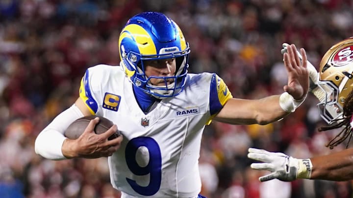 Dec 12, 2024; Santa Clara, California, USA; Los Angeles Rams quarterback Matthew Stafford (9) runs with the ball as San Francisco 49ers linebacker Fred Warner (54) defends in the fourth quarter at Levi's Stadium. Mandatory Credit: Cary Edmondson-Imagn Images Dec 12, 2024; Santa Clara, California, USA; Los Angeles Rams quarterback Matthew Stafford (9) runs with the ball as San Francisco 49ers linebacker Fred Warner (54) defends in the fourth quarter at Levi's Stadium. Mandatory Credit: Cary Edmondson-Imagn Images