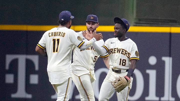 Aug 4, 2026; Milwaukee, Wisconsin, USA; Milwaukee Brewers outfielder Jackson Chourio (11), outfielder Garrett Mitchell (5) and outfielder Luis Lara (18) celebrate a win over the Pittsburgh Pirates at American Family Field. Mandatory Credit: Michael McLoone-Imagn Images