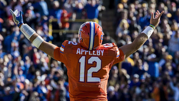 Nov 19, 2016; Baton Rouge, LA, USA; Florida Gators quarterback Austin Appleby (12) celebrates during the second half of the game against the LSU Tigers at Tiger Stadium. The Gators defeat the Tigers 16-10. Mandatory Credit: Jerome Miron-Imagn Images Nov 19, 2016; Baton Rouge, LA, USA; Florida Gators quarterback Austin Appleby (12) celebrates during the second half of the game against the LSU Tigers at Tiger Stadium. The Gators defeat the Tigers 16-10. Mandatory Credit: Jerome Miron-Imagn Images