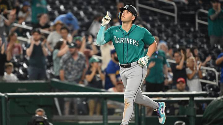 Jun 12, 2026; Washington, District of Columbia, USA;  Seattle Mariners designated hitter Dominic Canzone (8) points to the sky after hitting a home run against the Washington Nationals during the eighth inning at Nationals Park. Mandatory Credit: Rafael Suanes-Imagn Images